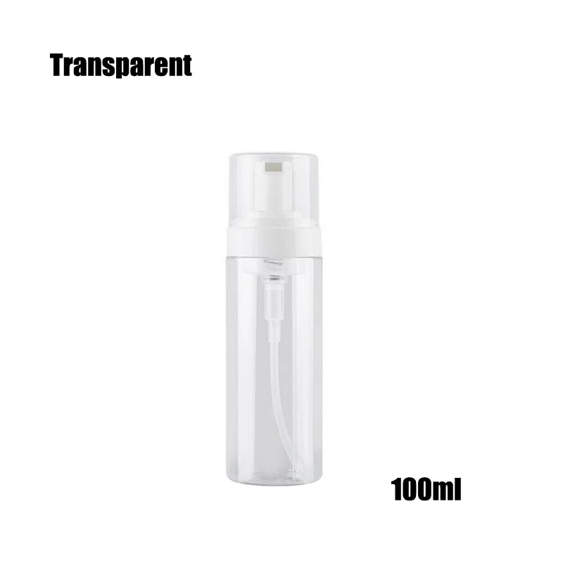 A clear, transparent plastic bottle with a white pump dispenser for liquid soap or lotion.