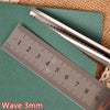 A silver pair of professional pinking shears is shown next to a ruler measuring 10 centimeters.