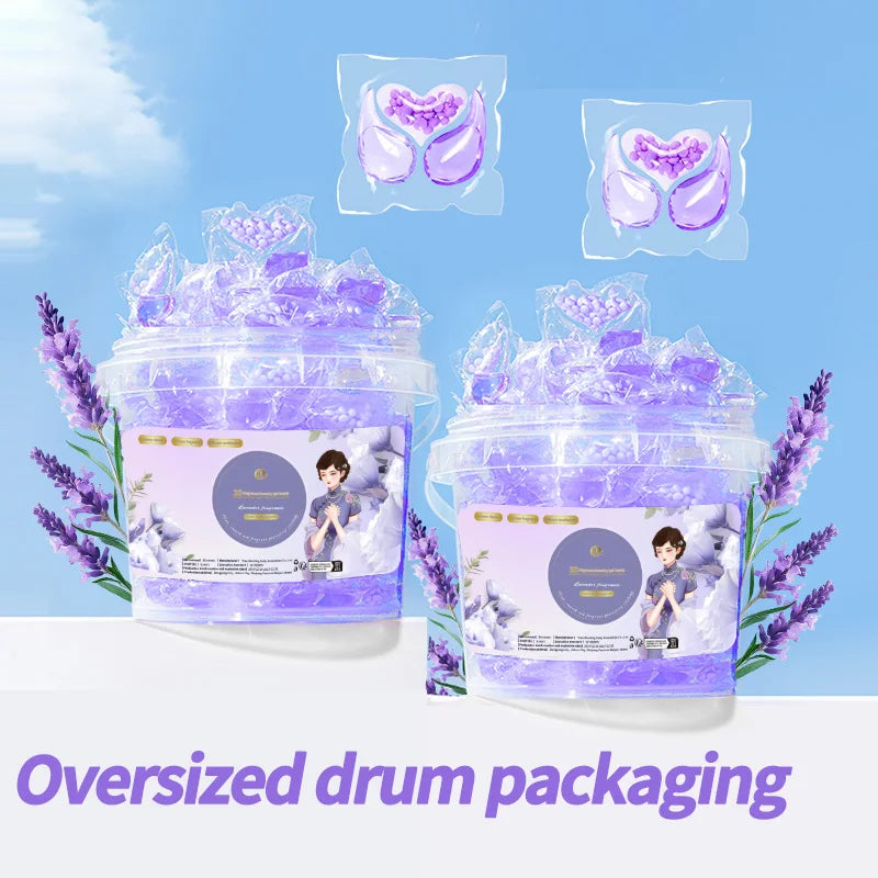 Purple laundry pods in oversized drum packaging with lavender flowers and heart shapes
