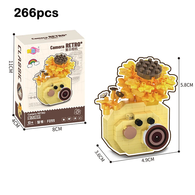A set of 266 pieces of Camera RETRO flower bonsai building blocks in yellow and brown colors.