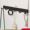 Black fantasy night clothes hooks with adhesive backing installed on a white wall