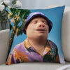 A novelty throw pillow cover featuring a portrait of John Pork wearing a purple hat.