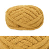 A ball of chunky chenille yarn in a golden tan color.