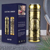 A gold electric shaver is displayed next to its packaging box on a gray surface.