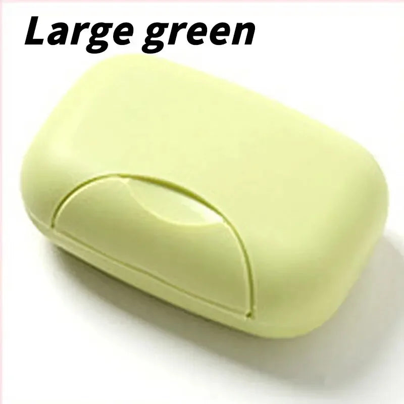 A large green portable soap holder with a lid shown in a close-up view.