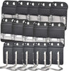 A set of black clip-on tool belt holsters designed for drills and power tools.