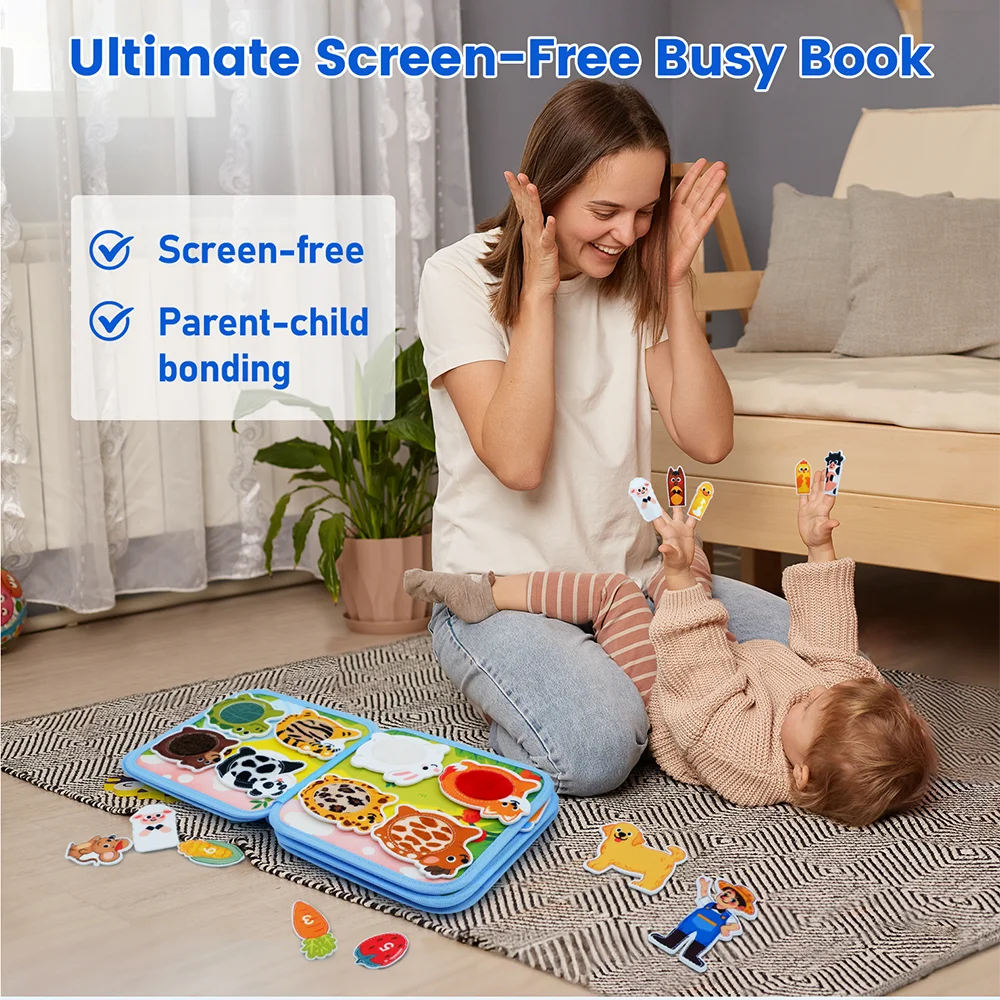 A mother is engaging with a colorful felt busy book and various small toys with her toddler on a rug.