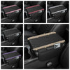 Black diamond quilted car armrest cover with storage featuring a textured pattern and decorative stitching.
