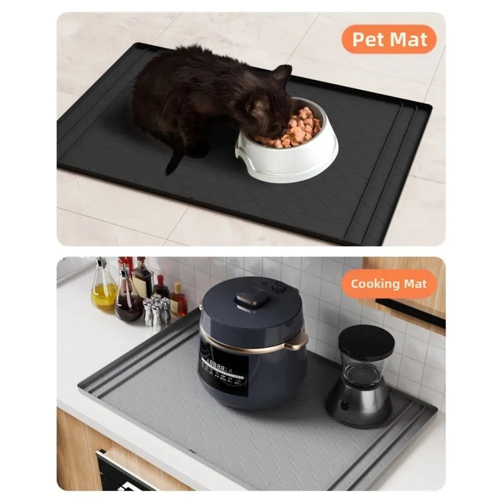 A black silicone mat protecting a pot on a kitchen counter.