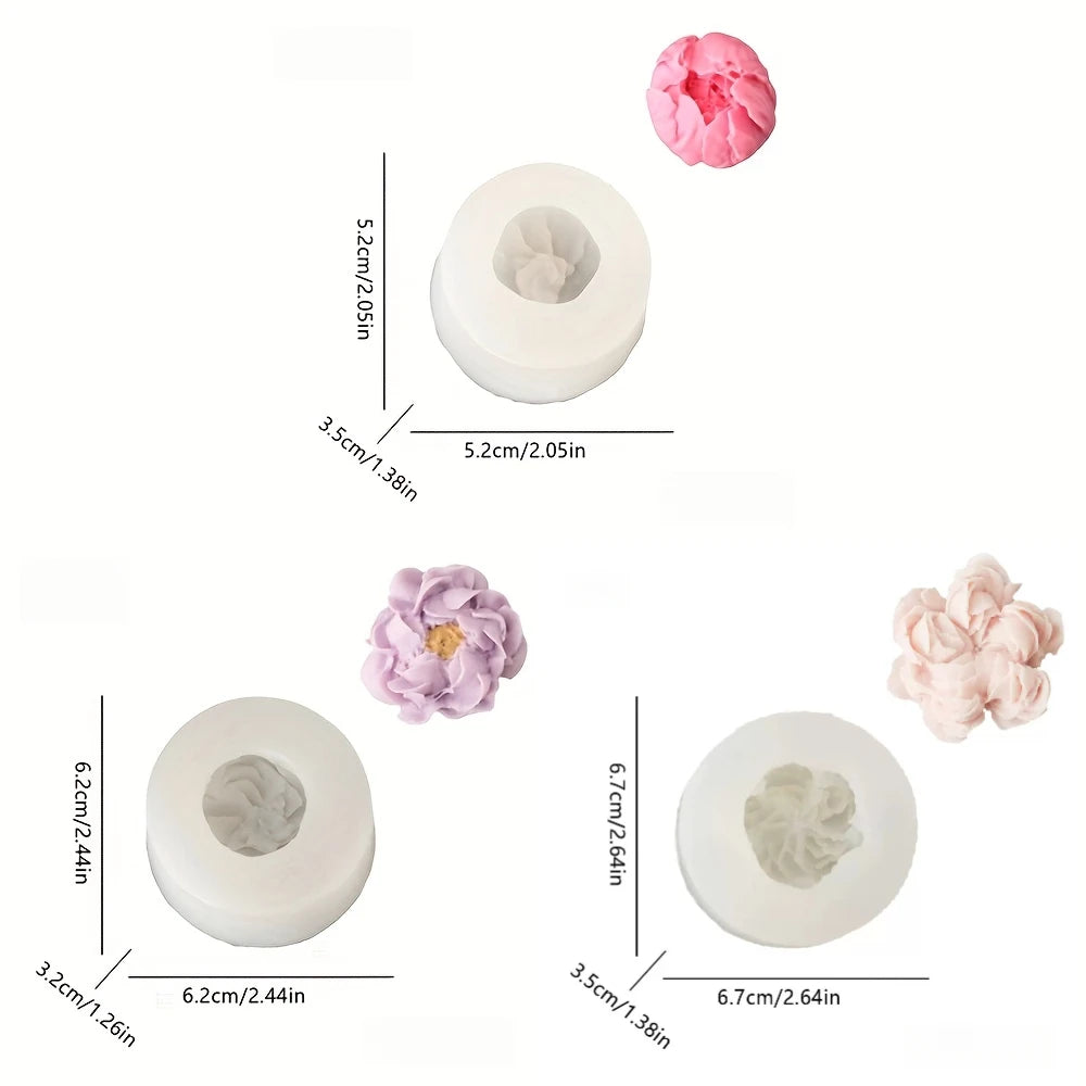 Un ensemble de moules en silicone pour cire de bougie, avec des formes florales roses et roses pâles.