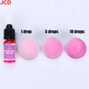 A set of fluorescent rose red liquid candle dye in various quantities: 1 drop, 5 drops, and 10 drops.