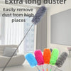 A set of retractable and removable extra long dusters in various colors including purple, pink, orange, and green, shown next