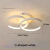 C-shaped white LED ceiling light fixture with a modern design and three color temperatures