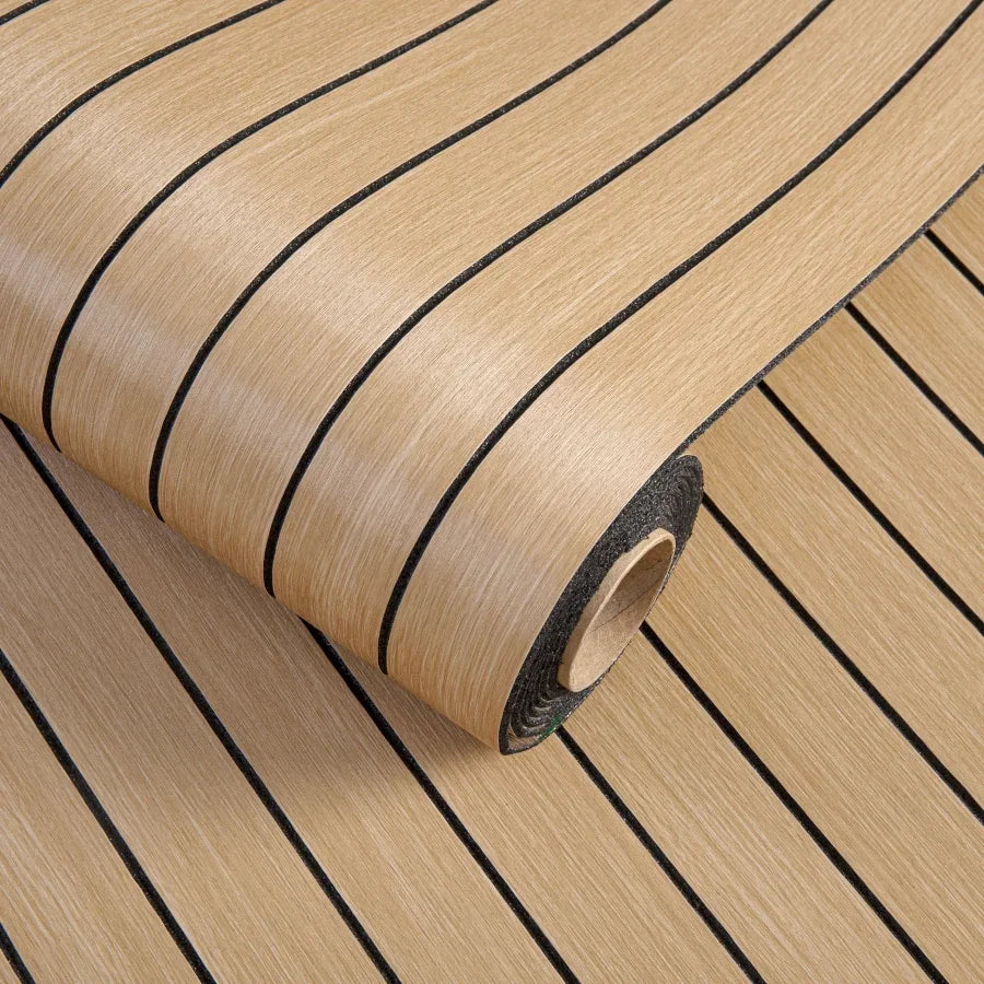 Roll of beige wood grain peel-and-stick wallpaper with black horizontal stripes