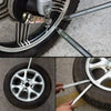 A heavy-duty tire iron with a dual-end design is shown interacting with a tire and wheel.