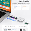 Boîtier NVMe SSD magnétique argenté et adaptateur multi-ports démontrant des capacités de transfert de données à haute vitess