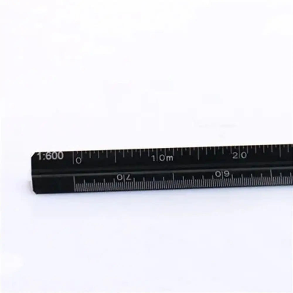 A black aluminum triangular scale ruler showing markings up to 20 centimeters.
