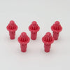 A set of five pink replacement drivers for a battling top, packaged as a 5-pack.