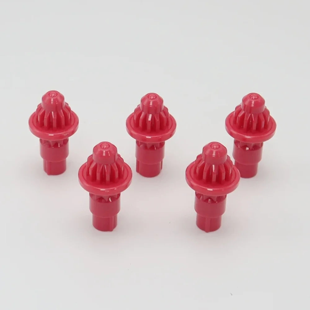 A set of five pink replacement drivers for a battling top, packaged as a 5-pack.