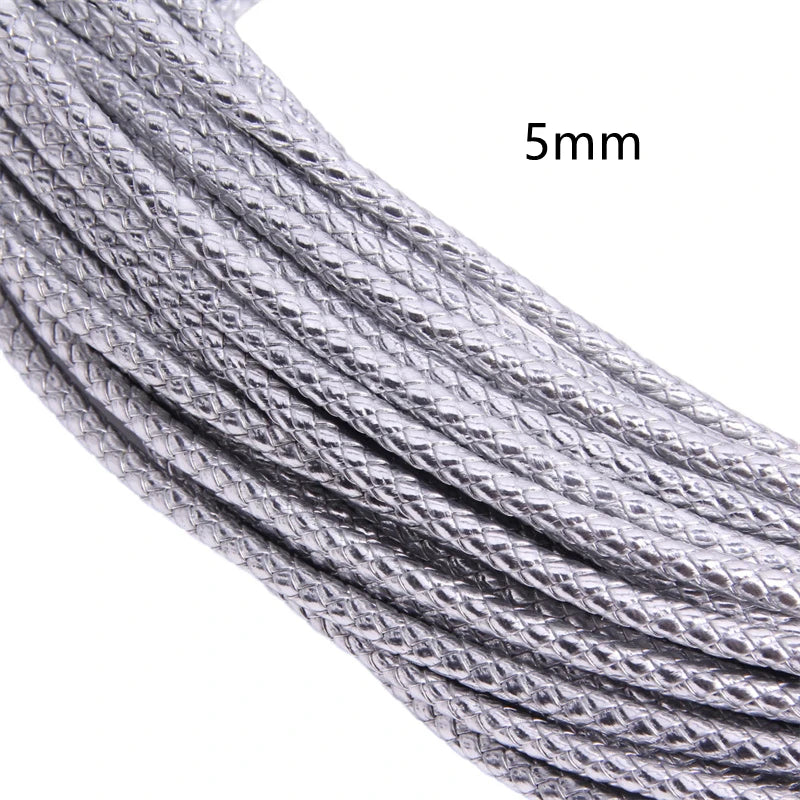 A close-up view of a silver braided leather cord, 5mm in diameter, shown in a spool or length.