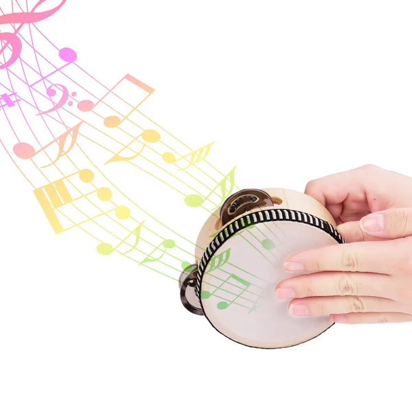 A hand is holding a compact wooden tambourine with metal jingles, overlaid with musical notes.