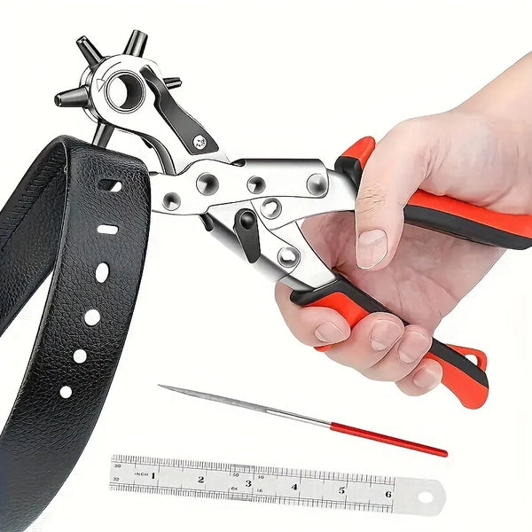 A hand is using heavy-duty leather hole punch pliers to pierce a black leather strap.