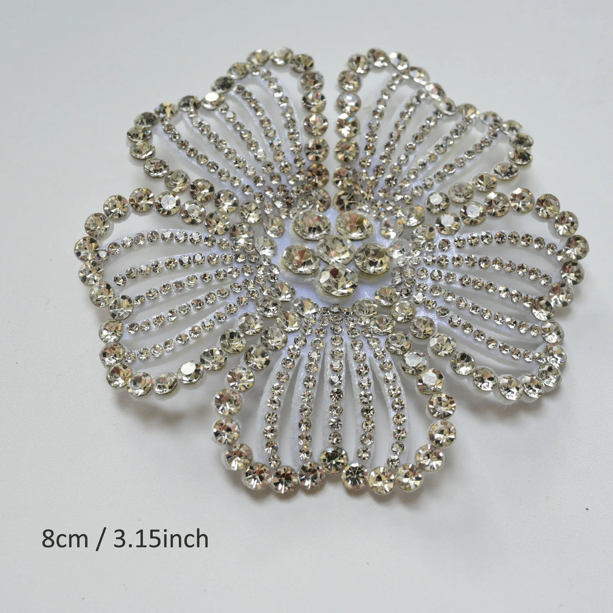 Silver crystal rhinestone flower patch with a detailed, radiating design.
