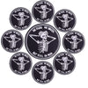 A set of ten black embroidered patches featuring a skull and bones design with the text But Still In Pain