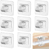 Various silver adhesive curtain rod hooks and wall mount clips shown in different angles