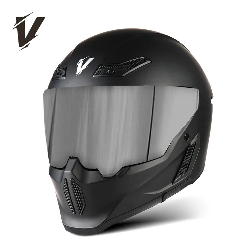 A black full-face motorcycle helmet with a smoked visor and ventilation features visible on a white background.