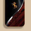 A phone case featuring a golden horse design on a dark background with a metallic gold finish.