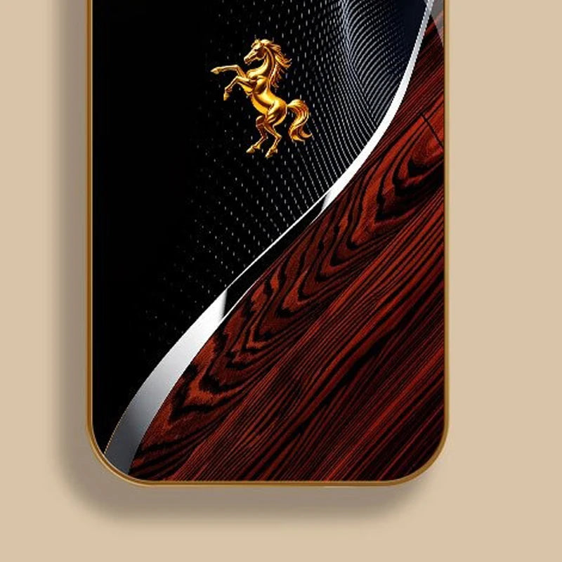 A phone case featuring a golden horse design on a dark background with a metallic gold finish.
