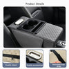 A black car armrest cushion with integrated cupholders, storage, and a hook-and-loop strap.