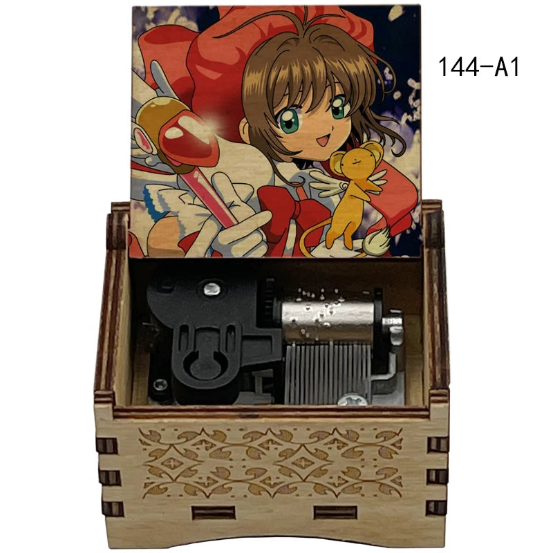 A wooden music box featuring a Cardcaptor Sakura theme with an illustration of Sakura and a yellow bear.