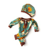 A knitted outfit for a baby doll featuring a teal and orange floral print jumpsuit and matching hat.