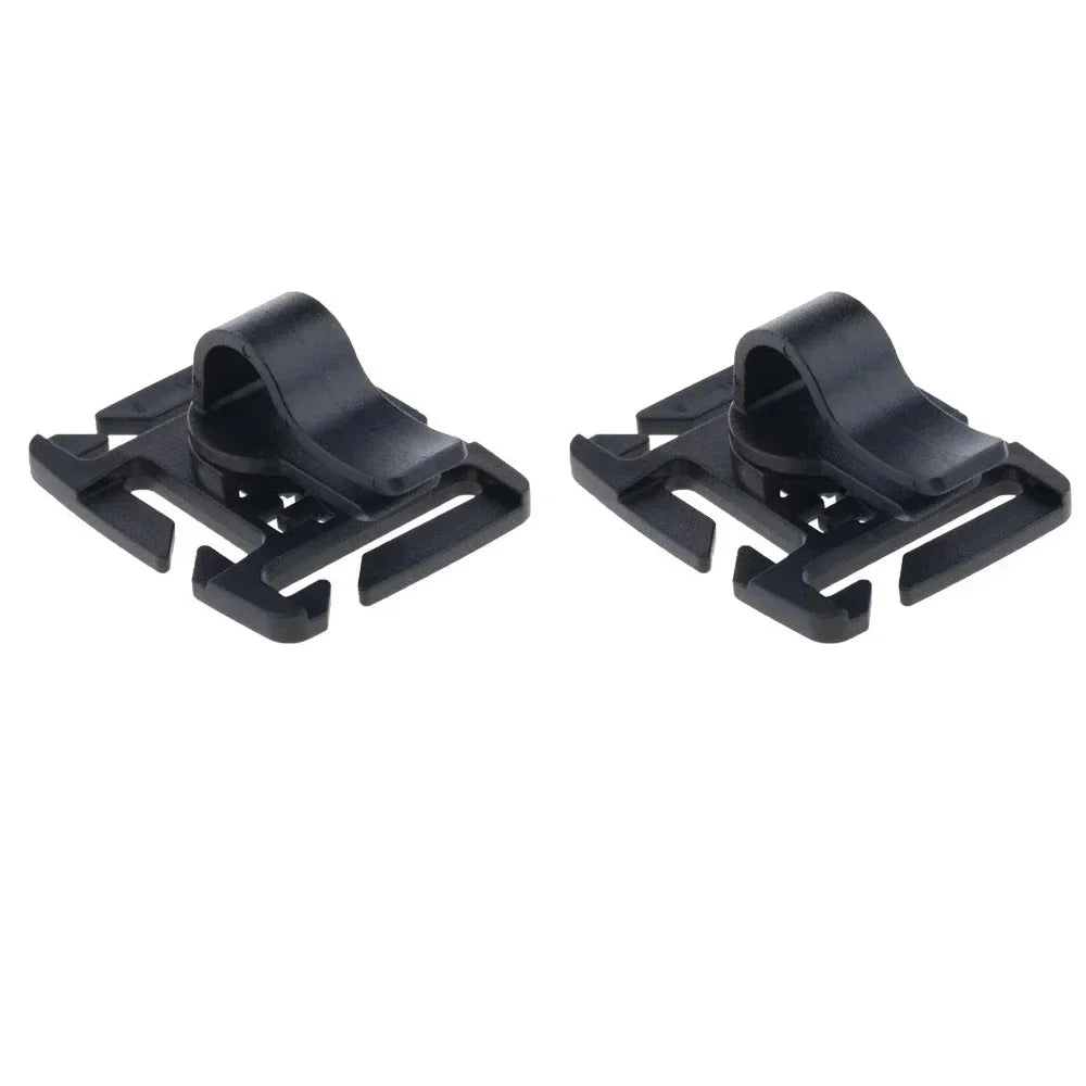 Black rotatable hydration tube clip designed for securing tubes to backpacks.