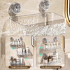 Wall-mounted suction cup storage basket with water ripple design showing various cosmetic and beauty tools.