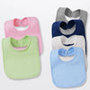 A collection of six cotton bandana bibs in various pastel and dark blue colors stacked vertically.