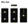 A set of three black heat-resistant gas stove protector mats with various dimensions shown against a white background.