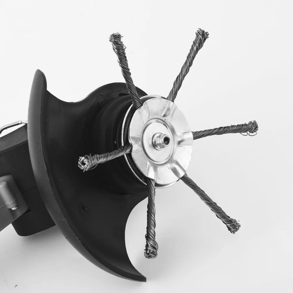 A close-up view of a black steel wire trimmer brush head with multiple wires, used for weed and moss removal.