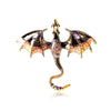 An enamel dragon brooch featuring gold accents and colorful rhinestones on a serpentine design.