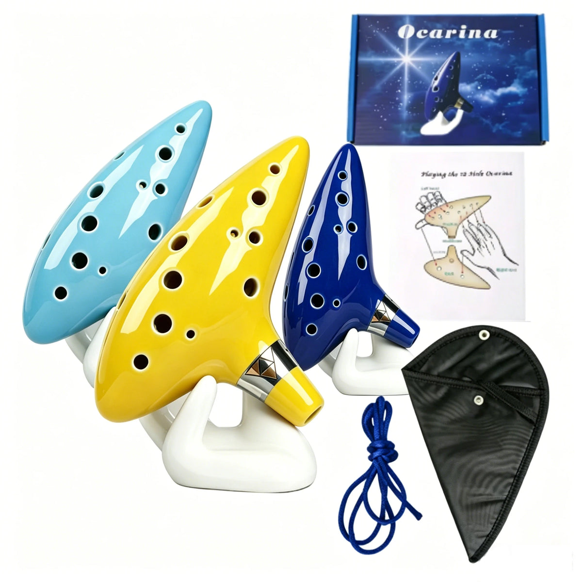 A yellow and blue ceramic ocarina set with a music book and storage bag