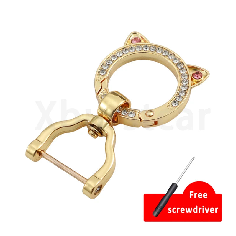 Gold-toned durable TPU key fob cover with a circular design and a screwdriver included