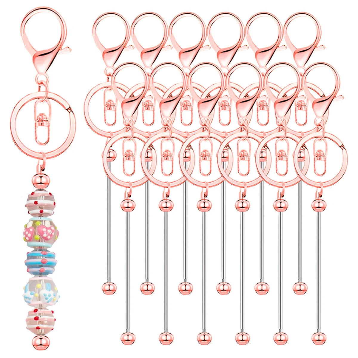 A set of pink metal beadable keychain bars for DIY jewelry making, featuring various sizes and styles.