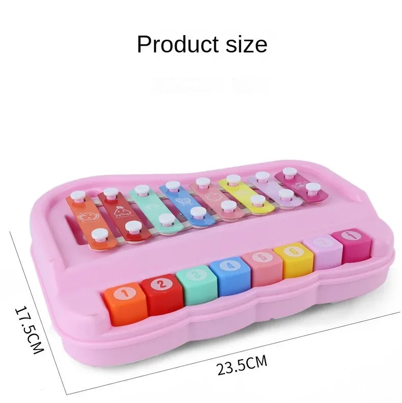 A pink Montessori musical xylophone piano with colorful wooden bars for toddlers.