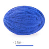 A ball of bright blue extra thick chenille yarn for hand knitting projects.