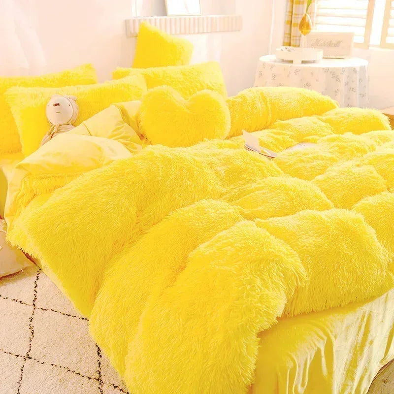A bright yellow plush mink velvet duvet cover set displayed on a bed.