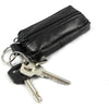 Black leather compact zippered coin purse with a metal key holder attached.
