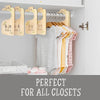 A set of eight wooden baby closet dividers with size labels for organizing clothes.