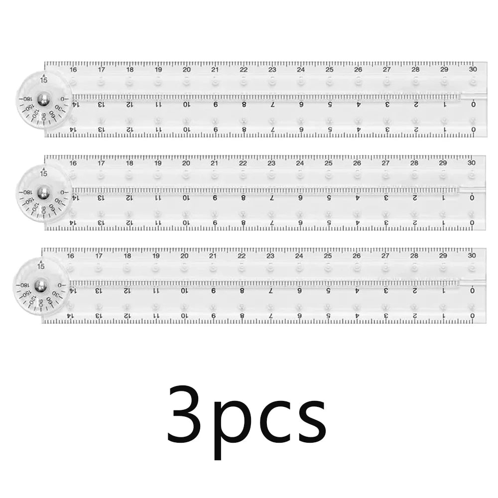 Three transparent plastic rulers or measuring tools laid out on a white background.